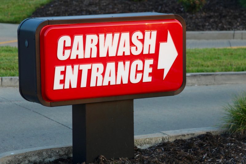 carwash, carwash sign, entrance, entrance sign, driveway, street, site design, carwash site design